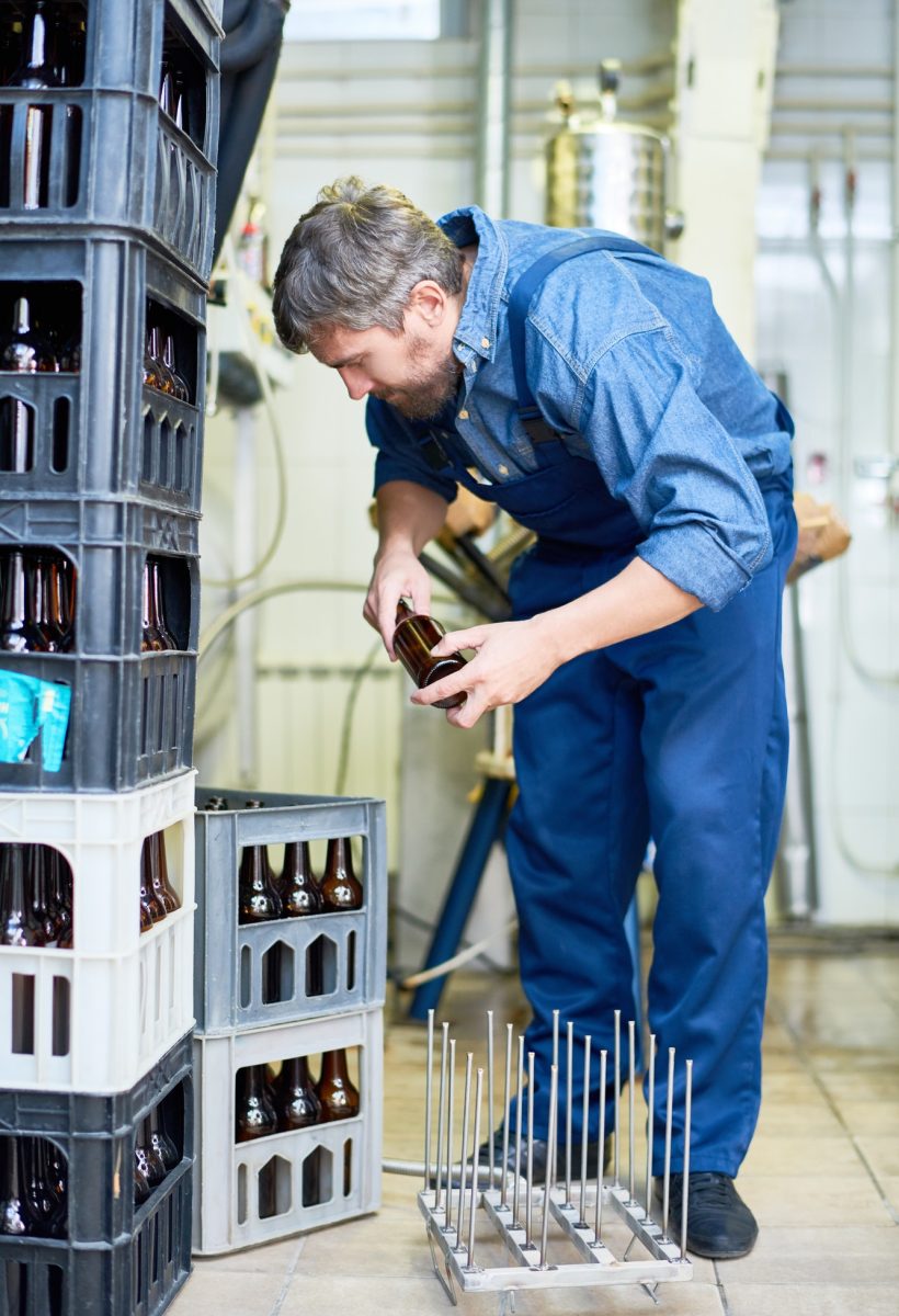 modern-brewery-worker-preparing-beer-bottles-for-loading.jpg modern-brewery-worker-preparing-beer-bottles-for-loading.jpg